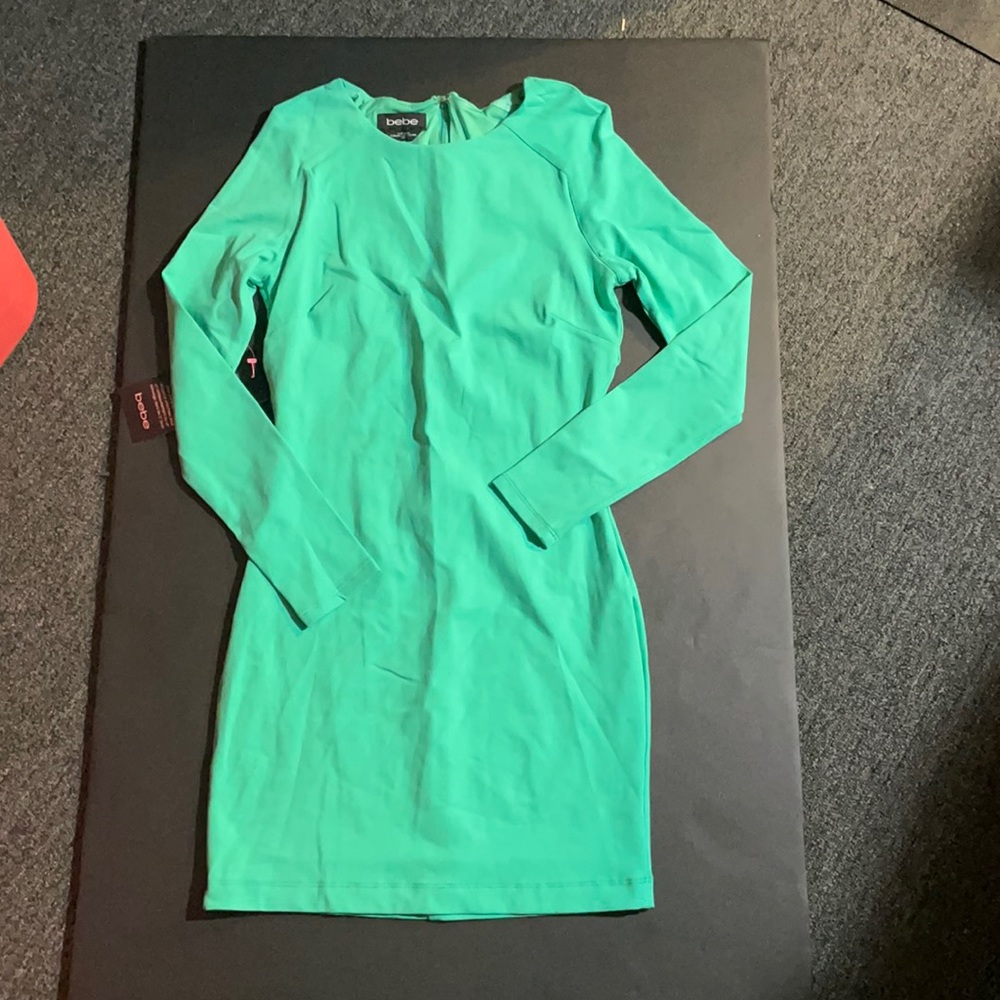 Green mini body con dress